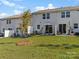 Private backyard with patio and grass at 18014 Pear Hawthorne Dr, Huntersville, NC 28078