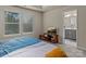 Main bedroom with ensuite bathroom access and TV stand at 18014 Pear Hawthorne Dr, Huntersville, NC 28078