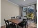 Casual dining area with wooden table and sliding glass doors at 18014 Pear Hawthorne Dr, Huntersville, NC 28078