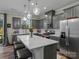 Modern kitchen with gray cabinets, white countertops and island at 18014 Pear Hawthorne Dr, Huntersville, NC 28078