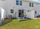 Private patio with table and chairs at 18014 Pear Hawthorne Dr, Huntersville, NC 28078