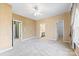 Spacious bedroom with carpet flooring and ceiling fan at 18819 Cloverstone Cir, Cornelius, NC 28031