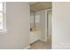 Bathroom with vanity and doorway to additional room at 2702 New Hamlin Way, Charlotte, NC 28210