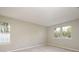 Bright bedroom with neutral walls and carpet, offering natural light at 2702 New Hamlin Way, Charlotte, NC 28210