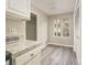 Bright kitchen with granite countertops, modern appliances, and stylish flooring at 2702 New Hamlin Way, Charlotte, NC 28210