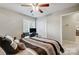 Bedroom with a desk, chair, and ceiling fan at 1500 Beth Haven Church Rd, Denver, NC 28037