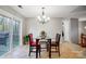 Bright dining area with glass table and access to deck at 1500 Beth Haven Church Rd, Denver, NC 28037