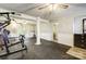 Spacious home gym with various equipment and flooring at 1500 Beth Haven Church Rd, Denver, NC 28037