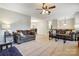 Open living room with neutral decor and view into dining area at 1500 Beth Haven Church Rd, Denver, NC 28037