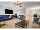 Bright living room with ample seating, large TV, and access to kitchen at 1500 Beth Haven Church Rd, Denver, NC 28037