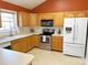 Functional kitchen with ample cabinetry and a white refrigerator at 452 Peaceful Creek Dr, York, SC 29745