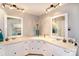 Elegant bathroom with double vanity and modern fixtures at 4723 Old Mountain Rd, Stony Point, NC 28678