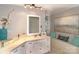 Bright bathroom features corner vanity and built-in shelving at 4723 Old Mountain Rd, Stony Point, NC 28678