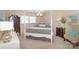 Charming bedroom with a post bed and plenty of closet space at 4723 Old Mountain Rd, Stony Point, NC 28678