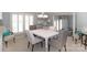 Elegant dining room with a large table and neutral color scheme at 4723 Old Mountain Rd, Stony Point, NC 28678