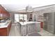 Spacious kitchen featuring an island, ample cabinetry, and stainless steel appliances at 4723 Old Mountain Rd, Stony Point, NC 28678