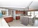 Spacious kitchen with island, ample cabinetry, and tile flooring at 4723 Old Mountain Rd, Stony Point, NC 28678