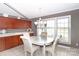 Bright kitchen nook with a charming table and window view at 4723 Old Mountain Rd, Stony Point, NC 28678