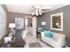 Bright office features a comfortable sofa and adjacent bathroom at 4723 Old Mountain Rd, Stony Point, NC 28678
