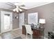 Home office with built-in desk and access to exterior at 4723 Old Mountain Rd, Stony Point, NC 28678