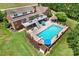 Inviting inground pool with brick coping, deck, and gazebo at 4723 Old Mountain Rd, Stony Point, NC 28678