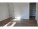 Cozy bedroom features hardwood floors, an attached walk-in closet, and neutral paint at 536 Robinhood Rd # 27, Maiden, NC 28650