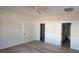 Bedroom showcasing wood flooring and a glimpse of a walk-in closet and bathroom at 536 Robinhood Rd # 27, Maiden, NC 28650