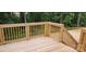 Exterior shot of a wooden deck with railings overlooking a wooded backyard at 536 Robinhood Rd # 27, Maiden, NC 28650