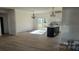 Open-concept living and kitchen area with an island and access to an outdoor deck at 536 Robinhood Rd # 27, Maiden, NC 28650
