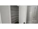 A large walk-in closet with multi-level shelving providing ample space for storage at 536 Robinhood Rd # 27, Maiden, NC 28650