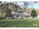 Ranch home with front porch and landscaping at 605 Lynch Rd, Lincolnton, NC 28092