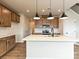 Contemporary kitchen with stainless steel appliances, a spacious island, and ample cabinet space at 5676 Clear Creek Ln, Charlotte, NC 28215