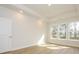 Bright bedroom with hardwood floors, recessed lighting, and large windows offering natural light at 7169 Chamberlain Dr, Harrisburg, NC 28075