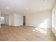 Open room with lots of natural light at 7169 Chamberlain Dr, Harrisburg, NC 28075