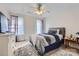 Cozy bedroom with a queen-size bed and window at 2240 Dunnwood Hills Dr, Matthews, NC 28105