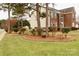 Two-story house with landscaping and brick accents at 2240 Dunnwood Hills Dr, Matthews, NC 28105