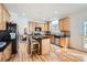 Kitchen boasts granite countertops and light wood cabinets at 2240 Dunnwood Hills Dr, Matthews, NC 28105