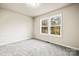 Bedroom with a double window at 3146 Captains Cove Ln, Lincolnton, NC 28092