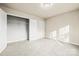 Bedroom featuring neutral carpet and closet with wire shelving at 3146 Captains Cove Ln, Lincolnton, NC 28092