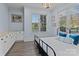 This cozy bedroom features a decorative chandelier and light-filled windows at 3678 Rankin Rd, Concord, NC 28027