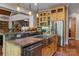 Kitchen featuring a stainless sink, granite countertops, a breakfast bar, and stainless appliances at 3678 Rankin Rd, Concord, NC 28027