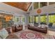 Spacious living room with vaulted ceilings, hardwood floors, and large windows with outdoor views at 3678 Rankin Rd, Concord, NC 28027