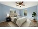 Cozy bedroom featuring a comfortable bed, stylish decor, and abundant natural light at 108 W Maryland Ave, Bessemer City, NC 28016