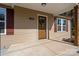 Charming front porch with decorative wreath, neutral siding, and decorative shutters at 108 W Maryland Ave, Bessemer City, NC 28016