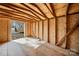 Unfinished interior with exposed wooden beams provides a blank canvas for customization at 108 W Maryland Ave, Bessemer City, NC 28016