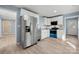 Modern kitchen with stainless steel appliances, white cabinets, and ample counter space at 108 W Maryland Ave, Bessemer City, NC 28016