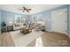 Bright living room with hardwood floors, ample natural light, and stylish furnishings at 108 W Maryland Ave, Bessemer City, NC 28016