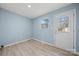 The space has a door to the exterior with vinyl flooring and freshly painted walls at 108 W Maryland Ave, Bessemer City, NC 28016