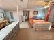 Cozy bedroom featuring carpet flooring, neutral walls, and comfortable sleeping arrangements at 115 Turner St, Lincolnton, NC 28092