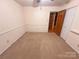 Empty bedroom featuring neutral walls, carpet, and a ceiling fan at 115 Turner St, Lincolnton, NC 28092